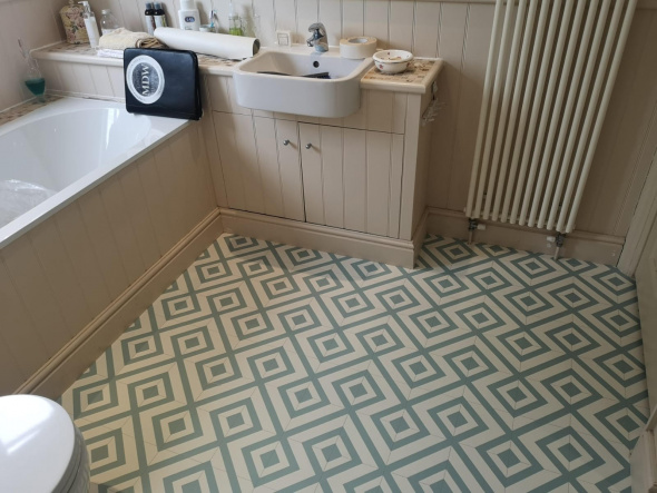 Stylish bathroom with sheet vinyl floor